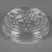 A clear glass Libbey Nob Hill ashtray with holes in it.