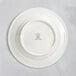 a white plate with a logo on it