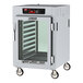 A white Metro C5 holding cabinet with clear glass doors.