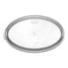 A clear plastic lid with a circular design.