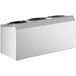 A white rectangular stainless steel box with three black round plastic cylinders inside.