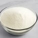 A bowl of Creamery Ave. Vegan Vanilla Soft Serve Mix powder.