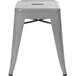 A silver Flash Furniture backless metal stool with a square seat.