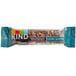 A KIND Dark Chocolate Nuts & Sea Salt bar with nuts and seeds.