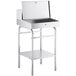A silver metal Lavex stationary receiving desk with a drawer and a shelf.