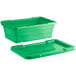 A green plastic container with a lid.