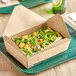 A salad in an EcoChoice kraft paper take-out box.