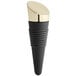 A black rubber Franmara bottle stopper with a gold-plated top.