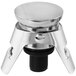 A Franmara stainless steel champagne stopper with a black rubber base and metal lid.