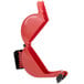 A red plastic Turn-O-Matic ticket dispenser with black handles.