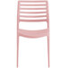 a pink plastic chair with a white background