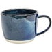 A blue and white Front of the House Artefact porcelain coffee cup with a handle.