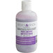 A bottle of Roxy & Rich Purple Amethyst cocoa butter with purple liquid inside.