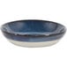 A Front of the House indigo and white porcelain ramekin with a rim.