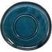 A Front of the House indigo porcelain saucer with a round rim and a circle in the center.
