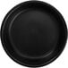 A black round International Tableware stoneware dish.
