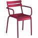 A red Lancaster Table & Seating outdoor arm chair with arms.