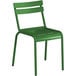 A green Lancaster Table & Seating outdoor side chair with metal legs and a backrest.