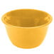 A yellow Thunder Group melamine bowl.