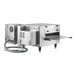 A Cooking Performance Group countertop conveyor oven with a 32" metal belt.