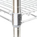 A Metro Super Erecta chrome wire shelf on a table.