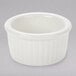 A white fluted Tuxton china ramekin.