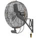 A Big Ass Fans wall-mounted fan in midnight black with a cord.