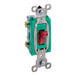 A green and silver Vollrath toggle switch with a red button.