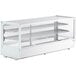 A white Avantco countertop bakery display case with shelves inside.