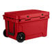 A red CaterGator outdoor cooler with black wheels.