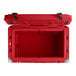 a red cooler box with a lid open