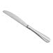 a silver butter knife on a white background