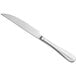 a silver butter knife on a white background