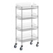 A Regency chrome metal cart with four shelves on wheels.