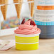a close up of a pink ice cream