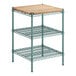 A Regency green metal shelf kit with removable wooden shelves.