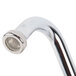 A close-up of a T&S deck-mounted faucet with lever handles.