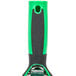 An Unger ErgoTec window squeegee with a green and black handle.