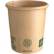 A brown New Roots compostable paper hot cup with green text.