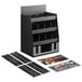 A black ServSense countertop condiment organizer with several compartments and labels.