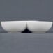 Two white CAC Super White three bowl tasting dishes stacked on a gray surface.