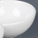 Two white rectangular bowls with a white rectangular bowl in the middle.