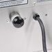 A close-up of a black power cord on a Bunn 3 gallon iced tea brewer.