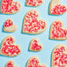 Heart shaped cookies with Adourne Valentine's Day Sprinkle Mix on top.