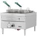 A large commercial Garland electric deep fryer with green handles.