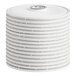 A stack of 12-inch white filter cartridges with a central opening, designed for filtration systems.