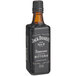 A black box with white text containing a bottle of Jack Daniel's Tennessee Bitters.