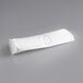 A white rolled up 3M Filtration Products polypropylene filter bag.