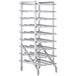 A white metal rack with metal shelves.