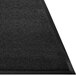 A black Guardian Prestige carpet entrance mat with a black border.